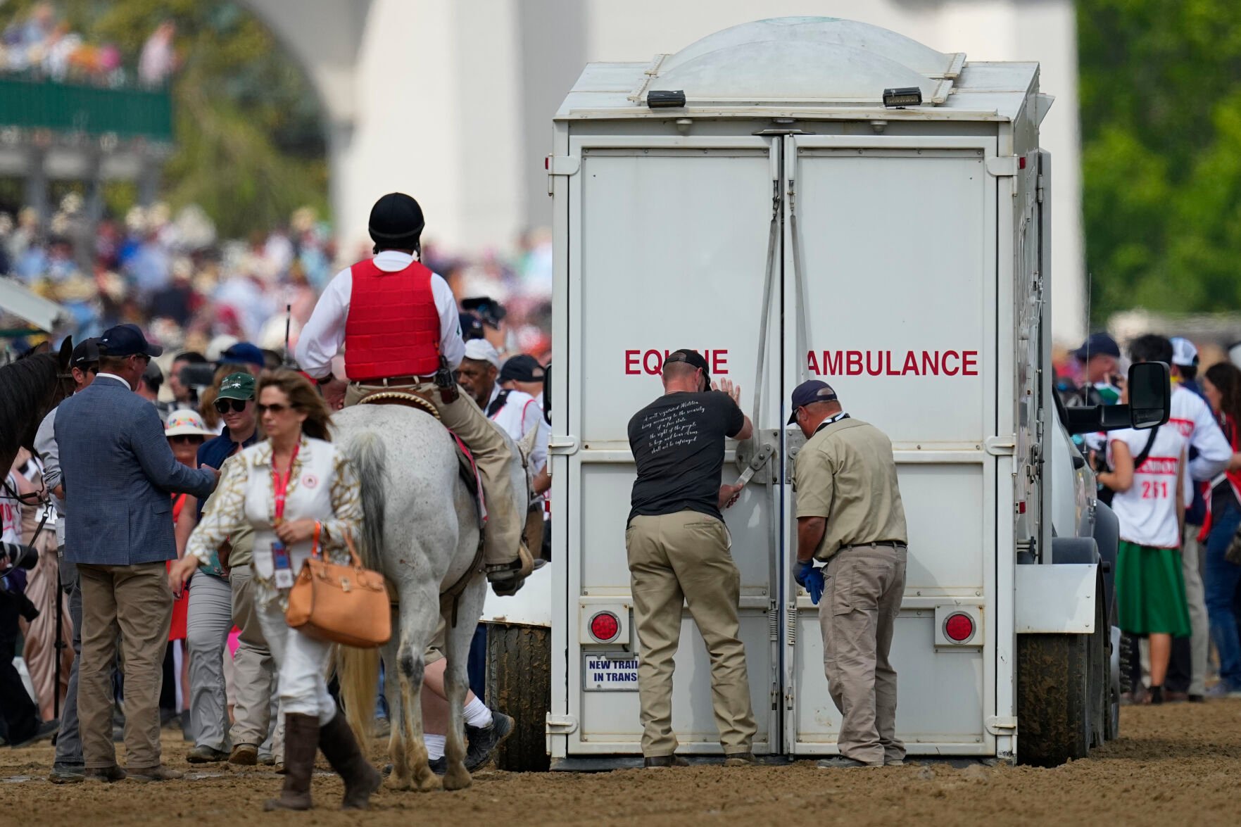 <p>Here Mi Song is taken to the equine ambulance after the 10th horse race at Churchill Downs Saturday, May 6, 2023, in Louisville, Ky. (AP Photo/Julio Cortez)</p>