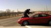 Body Cam Footage Shows Iowa Police Officer Clinging To Hood Of Car During Dramatic Chase