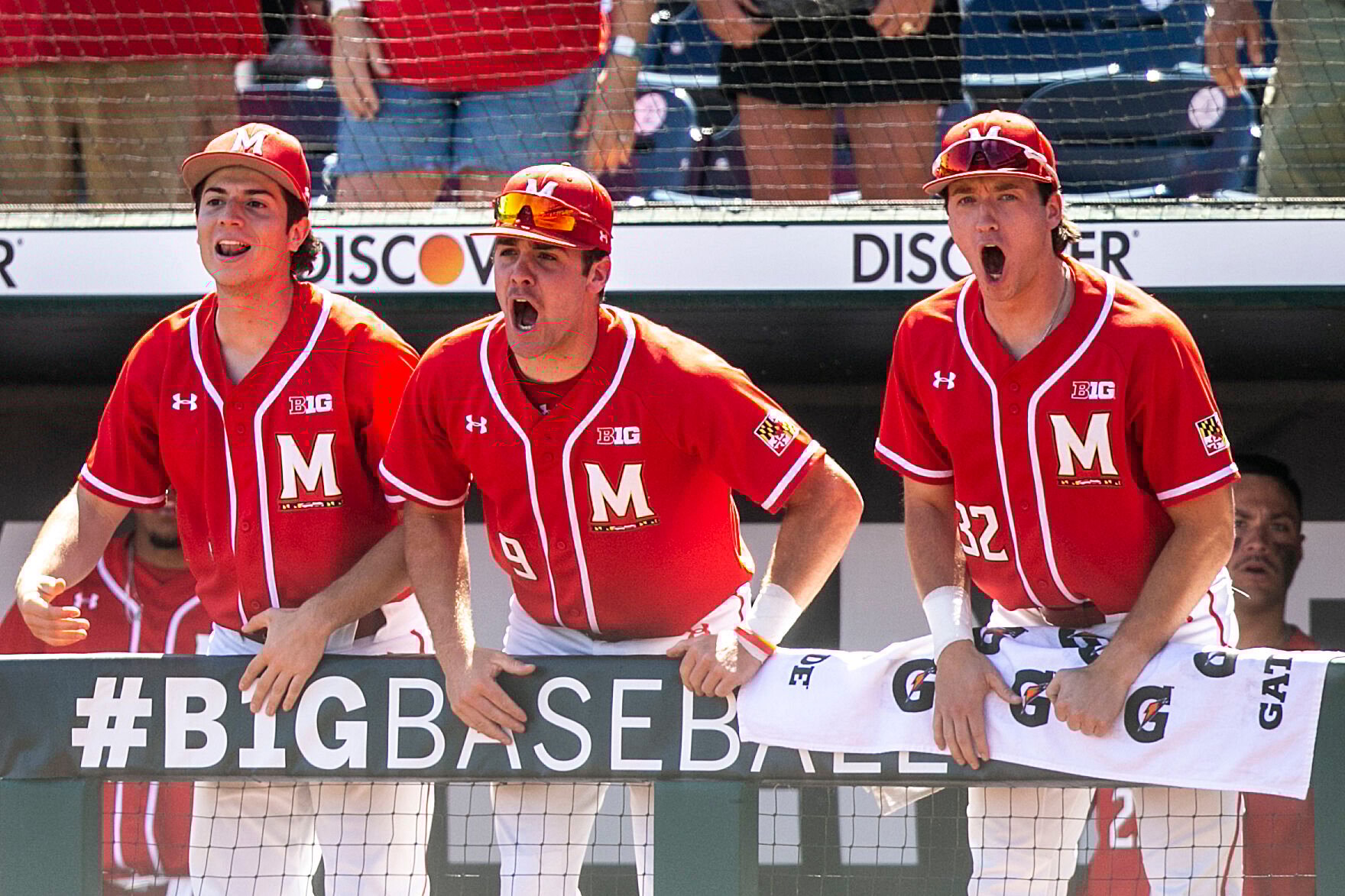 <p>Maryland's Simmi Whitehill, center, cheers on teammates during an college baseball game against Nebraska on Saturday in Omaha, Neb.</p>