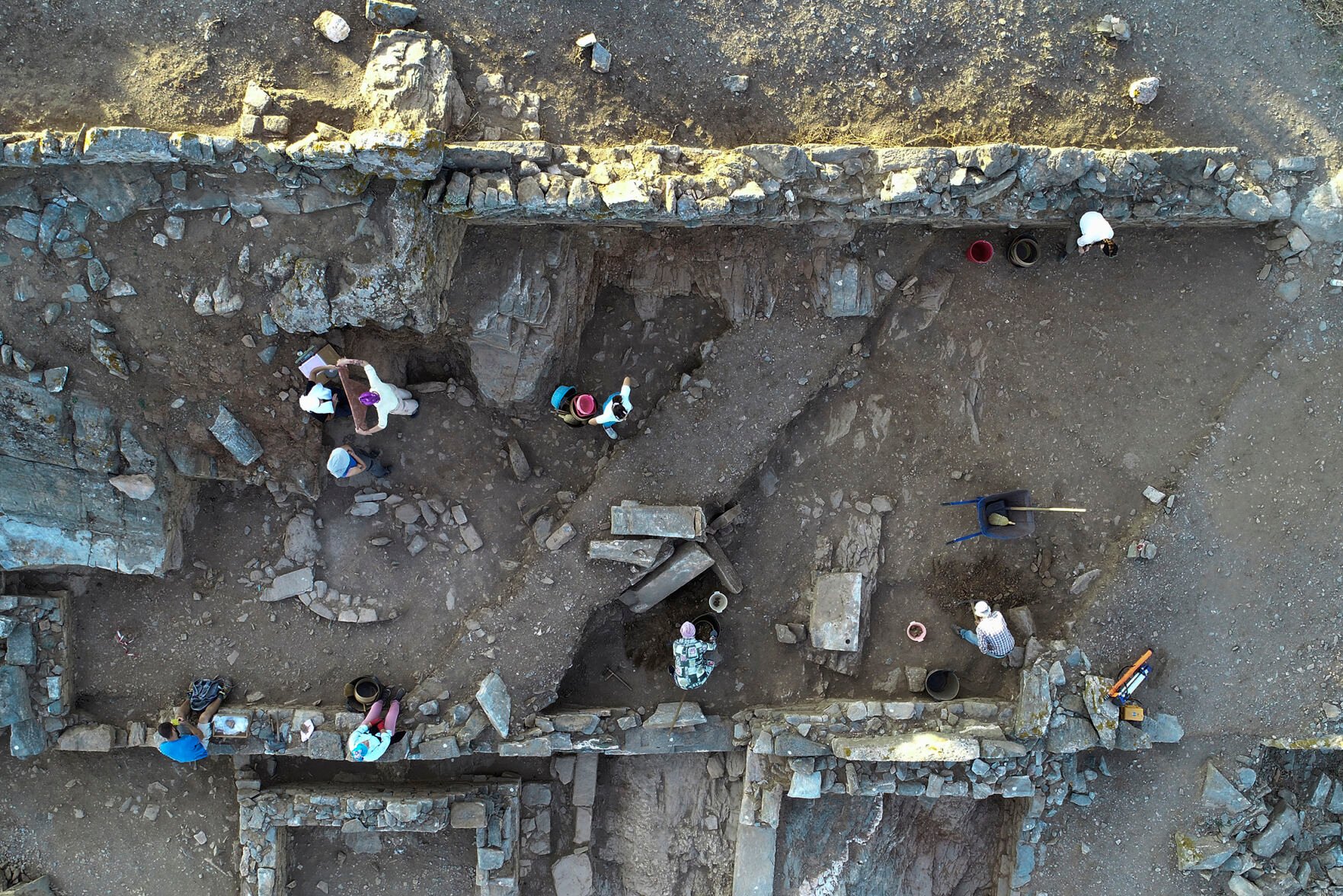 <p>Excavation staff work on the remains of an ancient sanctuary on the Aegean Sea island of Kythnos in this undated photo released by the Greek Culture Ministry on Wednesday.</p>