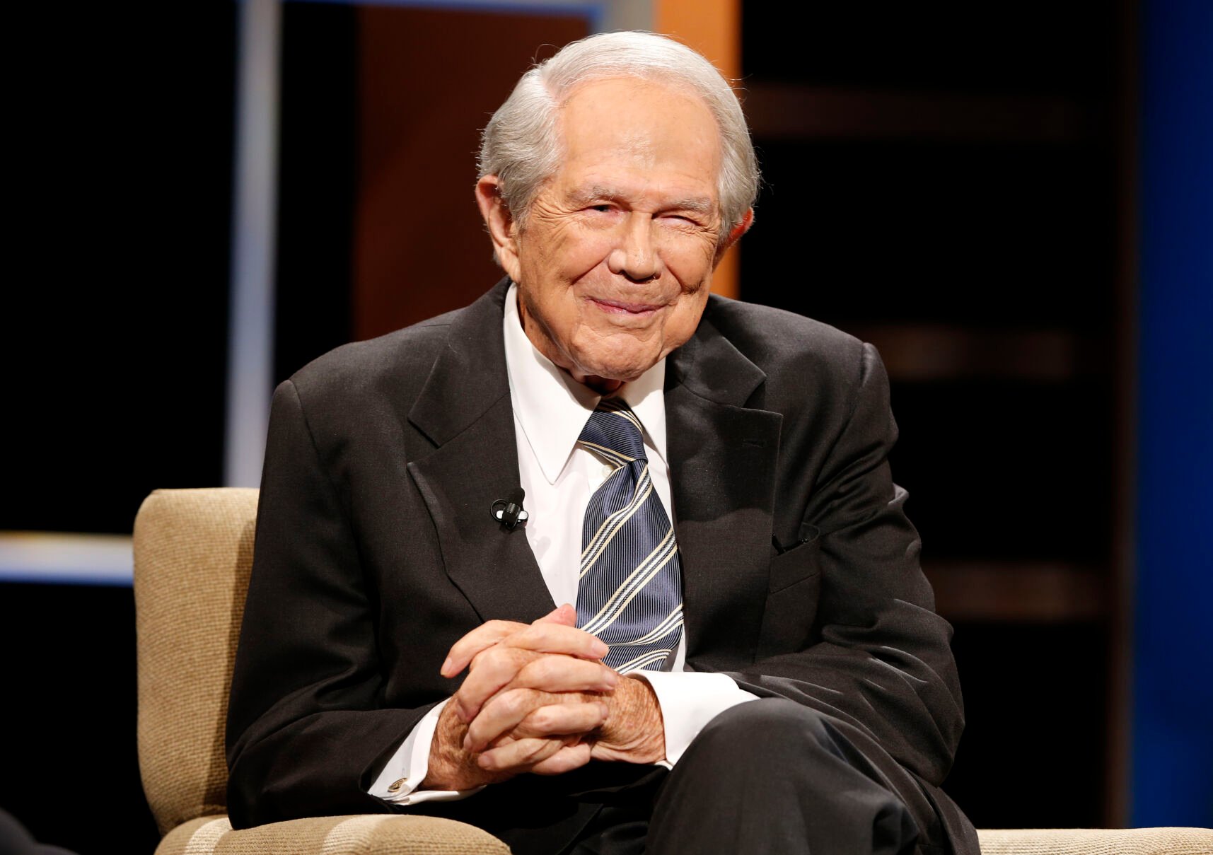 <p>FILE - Rev. Pat Robertson poses a question to a Republican presidential candidate during a forum at Regent University in Virginia Beach, Va., Oct. 23, 2015. Robertson, a religious broadcaster who turned a tiny Virginia station into the global Christian Broadcasting Network, tried a run for president and helped make religion central to Republican Party politics in America through his Christian Coalition, has died. He was 93. Robertson's death Thursday, June 8, 2023 was announced by his broadcasting network. (AP Photo/Steve Helber, File)</p>