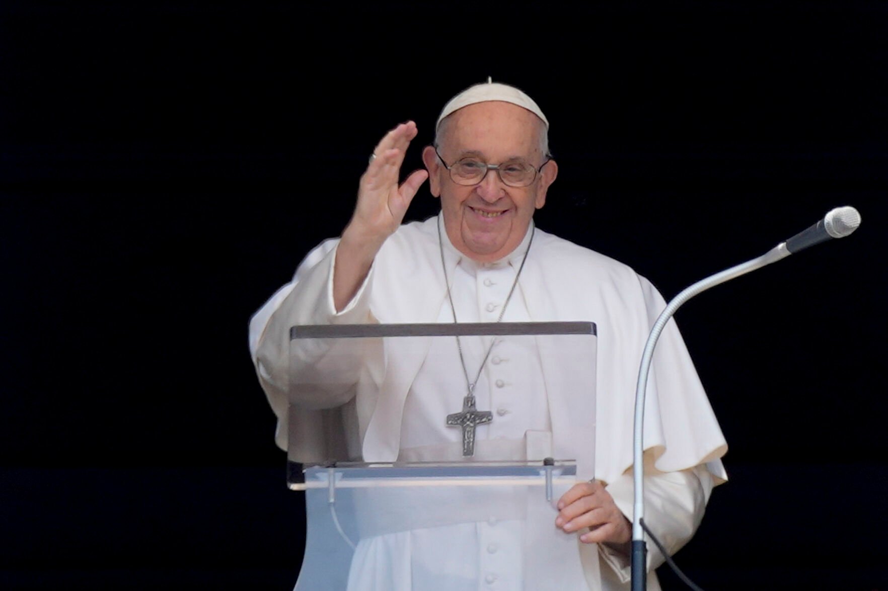 <p>Pope Francis delivers his blessing as he recites the Angelus noon prayer from the window of his studio overlooking St. Peter's Square, at the Vatican, on June 18.</p>