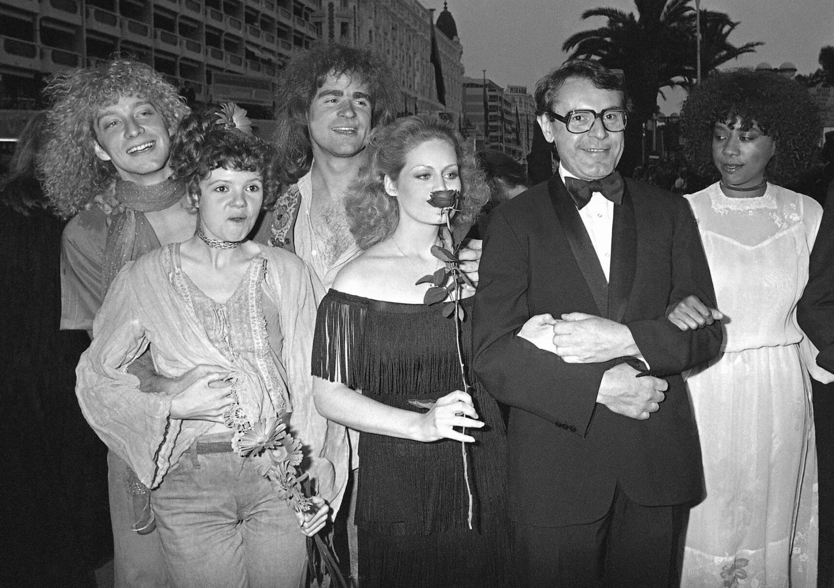 <p>FILE - U.S. actors, from left, Don Dacus, Annie Golden, Treat Williams, Beverly d'Angelo, director Milos Forman, and Cheryl Barnes arrive for the presentation of "Hair" during the 32nd Cannes Film Festival in Cannes, France May 10, 1979. Williams, whose nearly 50-year career included starring roles in the TV series “Everwood” and the movie “Hair,” died Monday, June 12, 2023, after a motorcycle crash in Vermont, state police said. He was 71. (AP Photo/Levy, File)</p>