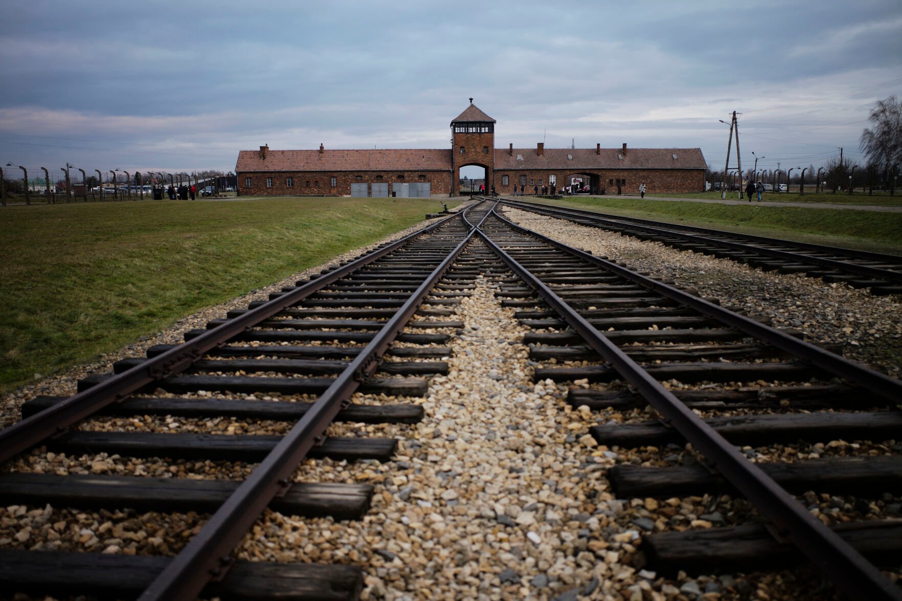 <p>The railway tracks where hundred thousands of people arrived to be directed to the gas chambers inside the former Nazi death camp of Auschwitz Birkenau, or Auschwitz II, are pictured in Oswiecim, Poland, on Dec. 7, 2019. </p>