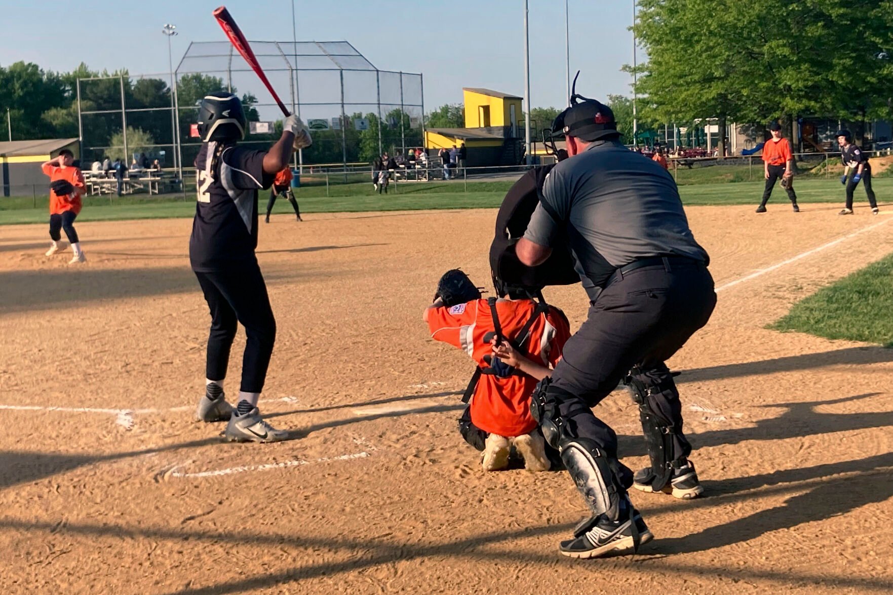 <p>Umpire Jim McDevitt calls balls and strikes at a Deptford Little League game in Deptford, N.J., May 10. McDevitt has worked as a volunteer Deptford umpire for 20 years. But he turns 66 this month and won’t call games much longer.</p>