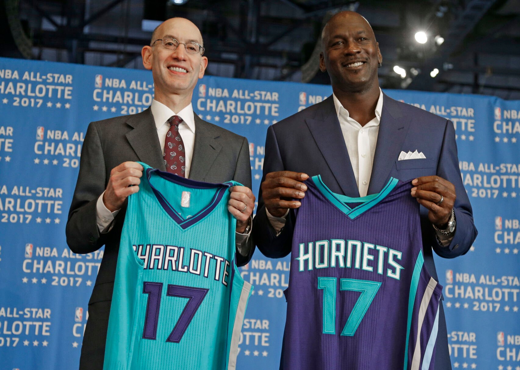 <p>FILE - NBA commissioner Adam Silver, left, and Charlotte Hornets owner Michael Jordan pose for a photo during a news conference to announce Charlotte, N.C., as the site of the 2017 NBA All-Star basketball game, June 23, 2015. Michael Jordan is finalizing a deal to sell the majority share of the Charlotte Hornets, a move that will end his 13-year run overseeing the organization, the team announced Friday, June 16, 2023. Jordan is selling to a group led by Gabe Plotkin and Rick Schnall, the Hornets said. (AP Photo/Chuck Burton, File)</p>