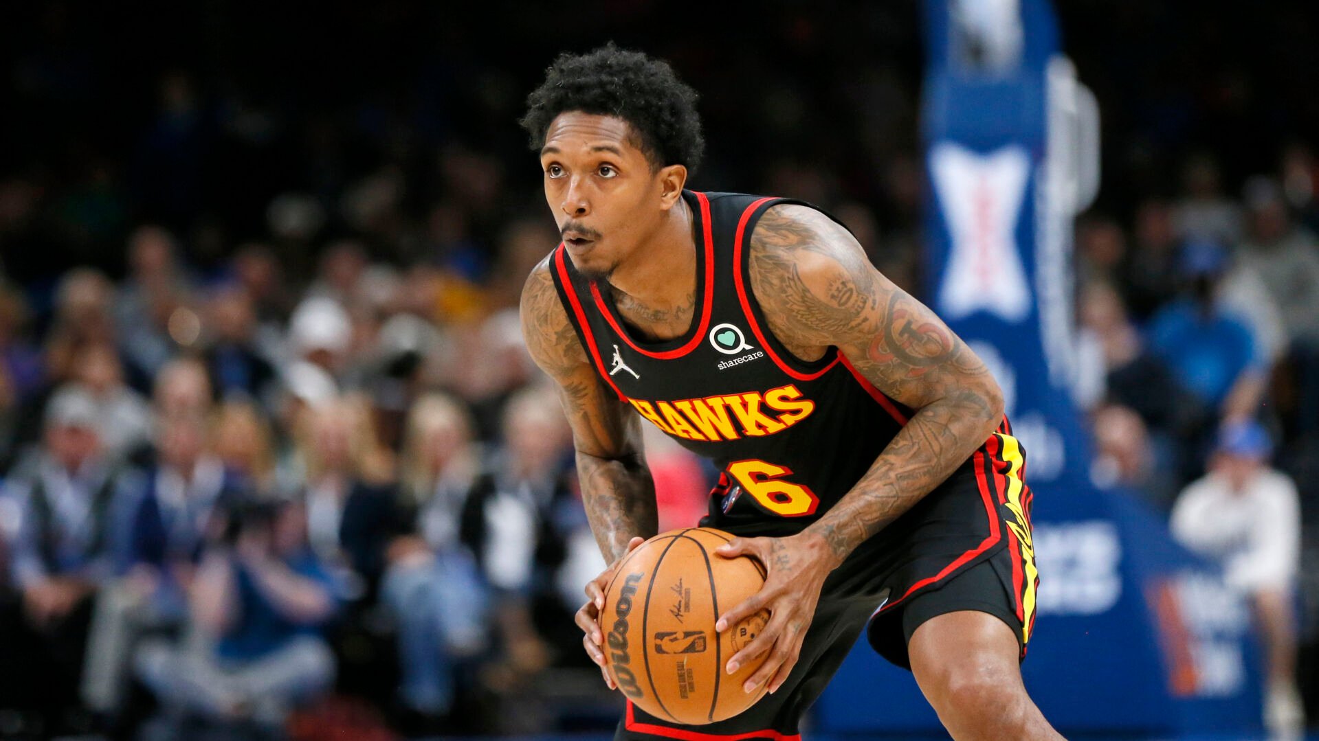<p>Atlanta Hawks guard Lou Williams holds the ball during the first half of an a game against the Oklahoma City Thunder on March 30, 2022, in Oklahoma City.</p>