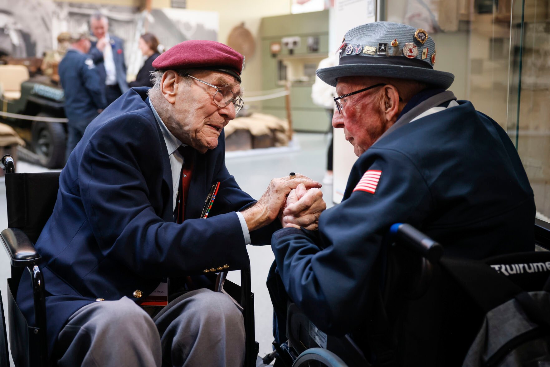 <p>World War II veteran Britain's Bill Gladden, left, speaks with U.S WWII veteran Jack M. Larson in the Pegasus Bridge memorial in Benouville, Normandy, on June 5.</p>