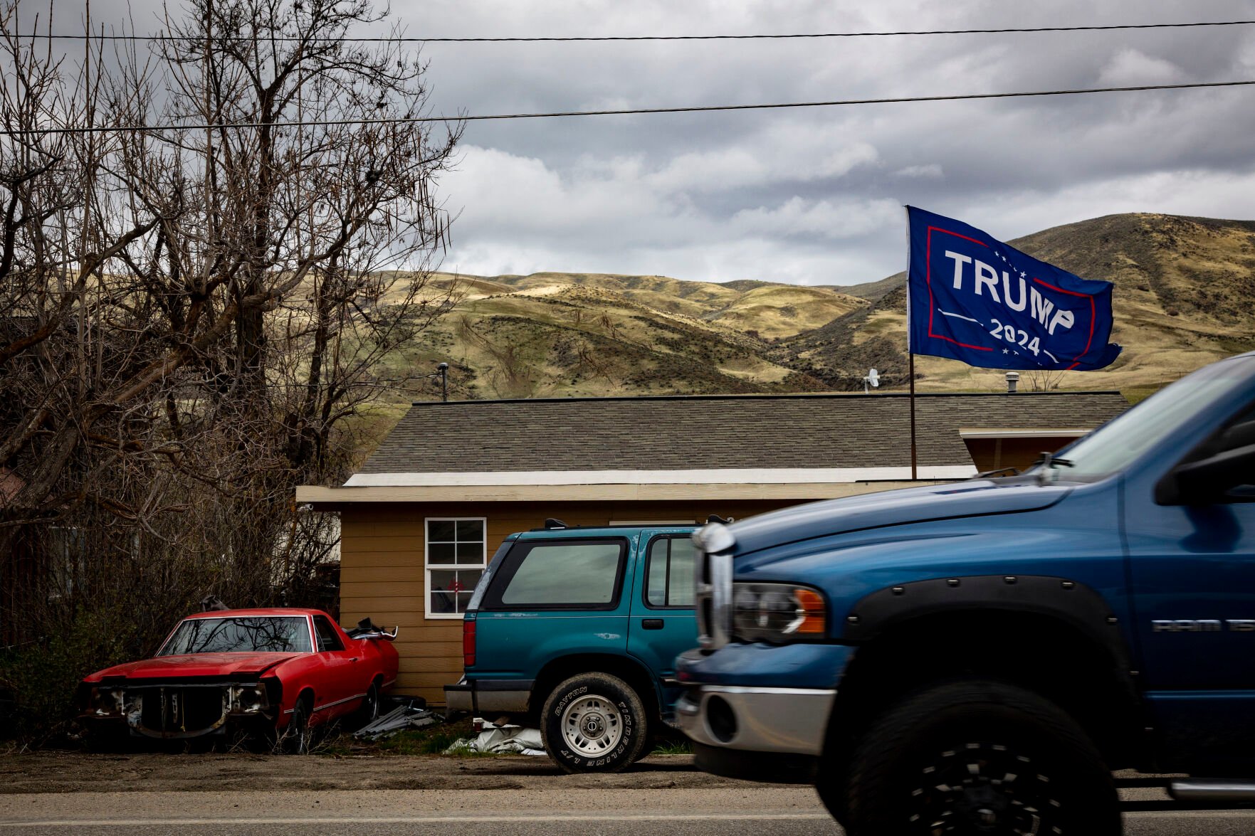 <p>A flag supporting former President Donald Trump for president in 2024 flies in the front yard of a house April 24 in Horseshoe Bend, Idaho.</p>