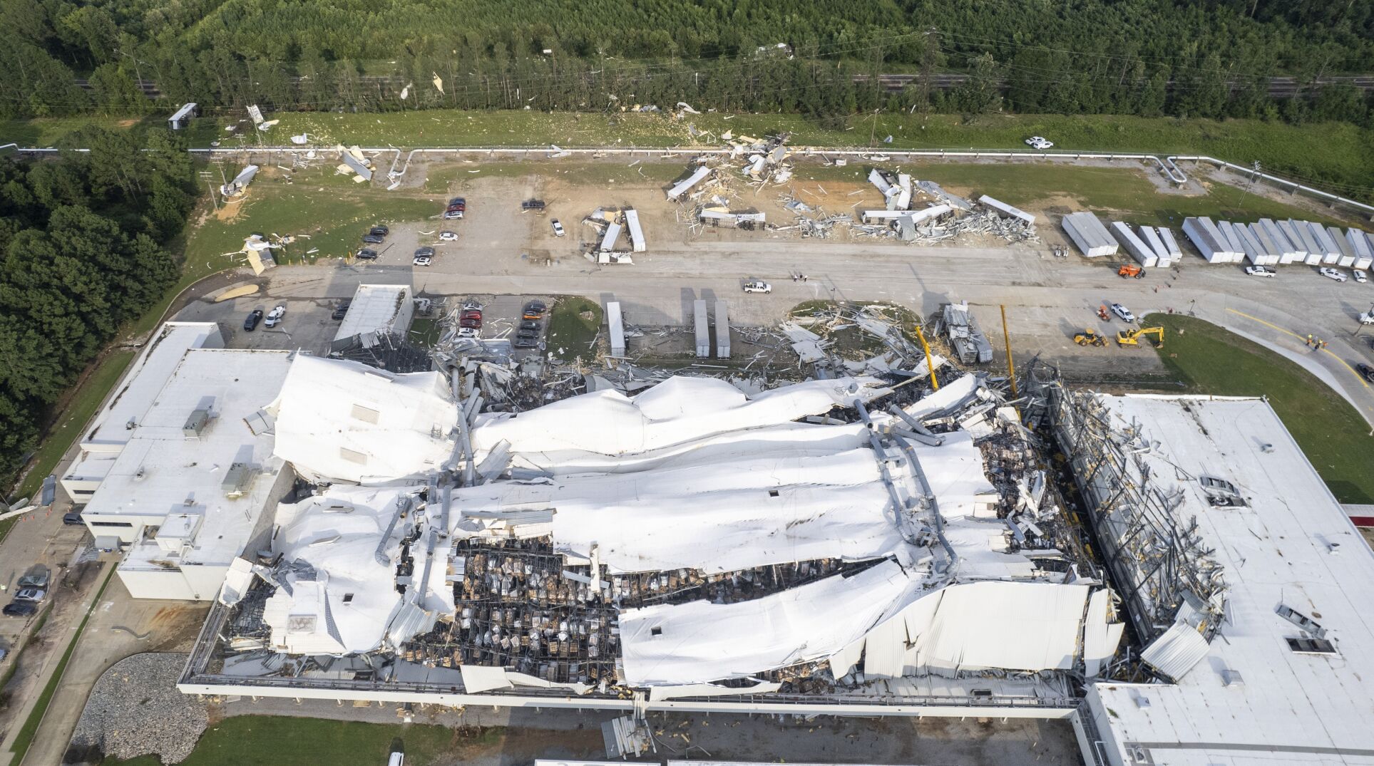 <p>FILE - Debris is scattered around the Pfizer facility on Wednesday, July 19, 2023, in Rocky Mount, N.C., after damage from severe weather. On Friday, July 21, The Associated Press reported on stories circulating online incorrectly claiming the plant damaged by a tornado was stocked with the company’s COVID-19 vaccine. (Travis Long/The News & Observer via AP, File)</p>