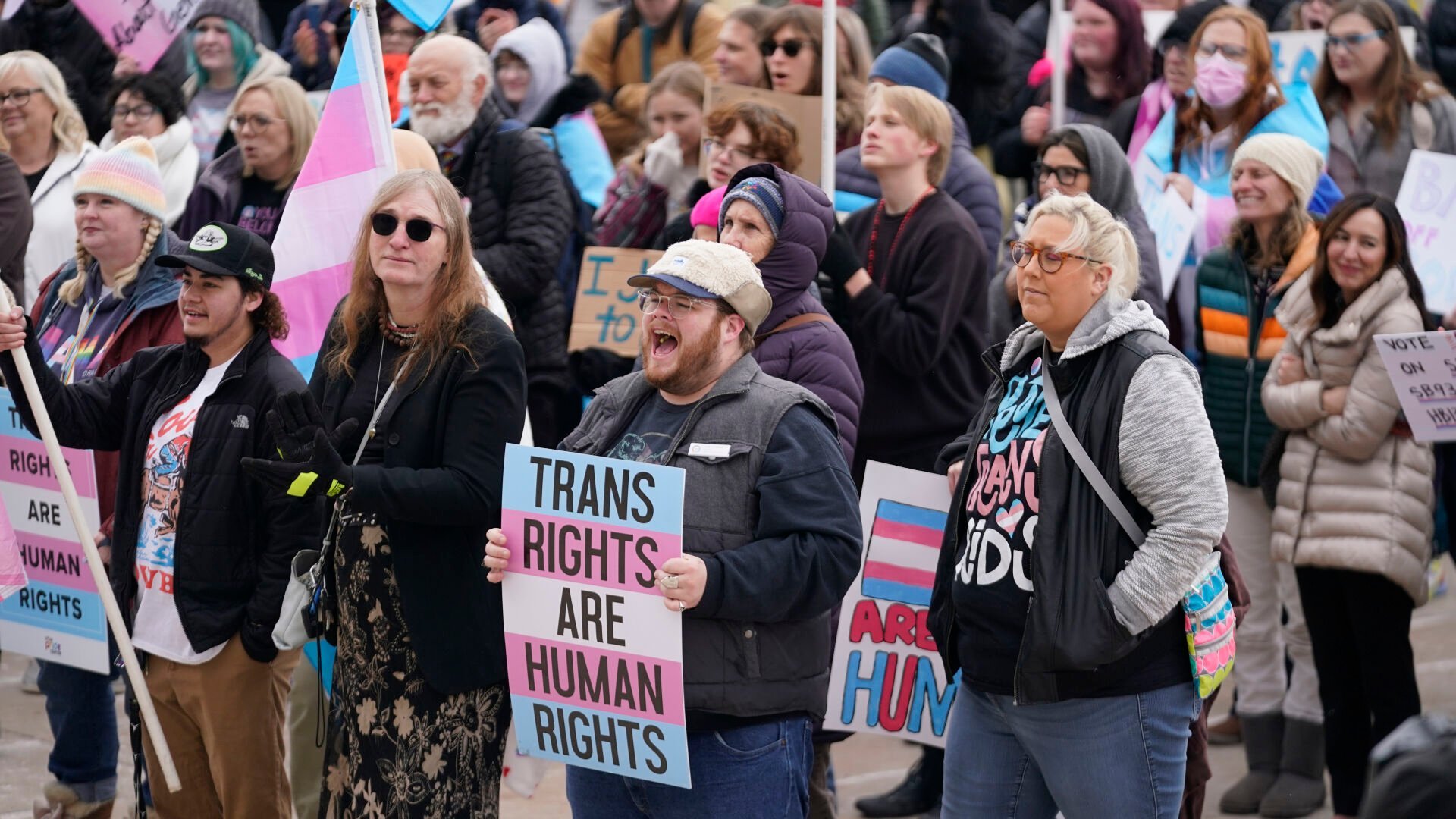 <p>FILE -People gather in support of transgender youth during a rally at the Utah State Capitol Tuesday, Jan. 24, 2023, in Salt Lake City. </p>