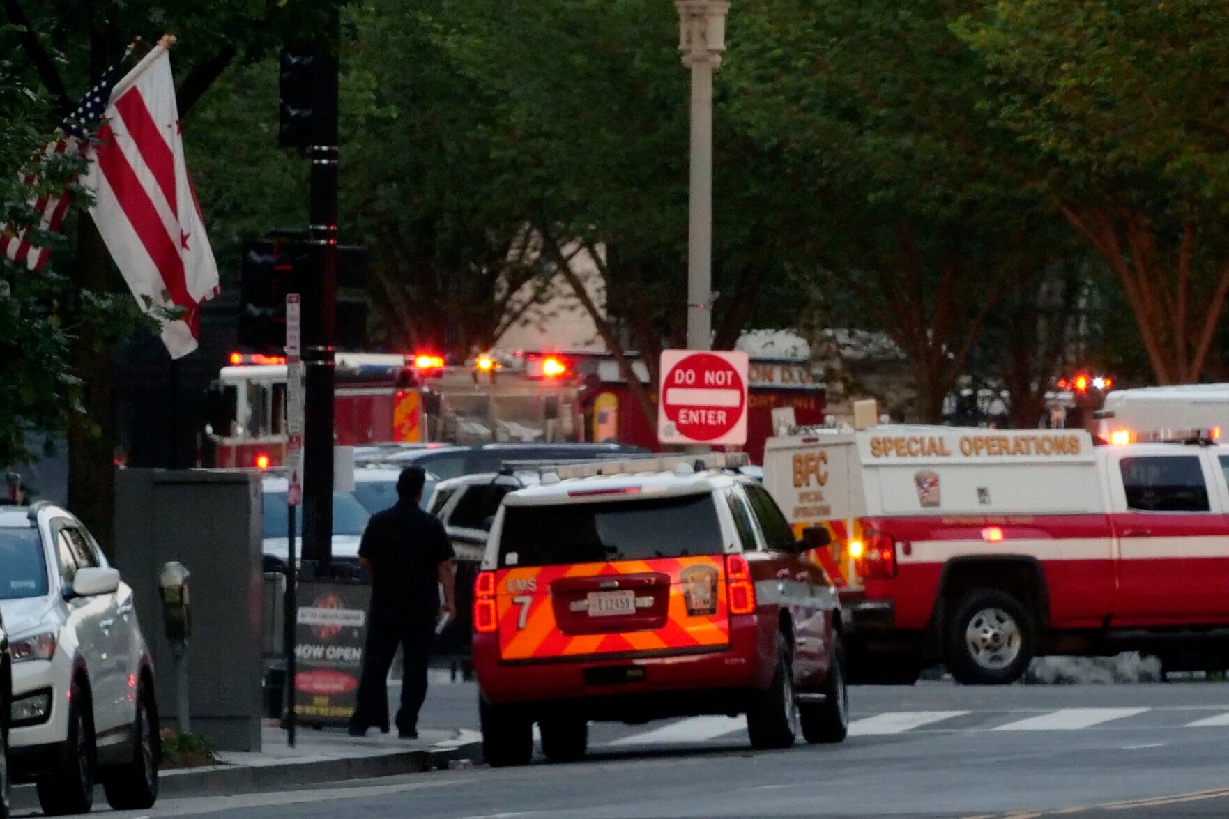<p>D.C. Fire Department vehicles are seen outside the White House grounds, Sunday night, July 2, 2023 in Washington. The White House was briefly evacuated Sunday evening while President Joe Biden was at Camp David after the Secret Service discovered suspicious powder in a common area of the West Wing, and a preliminary test showed the substance was cocaine, two law enforcement officials said Tuesday. (Anthony Peltier via AP)</p>
