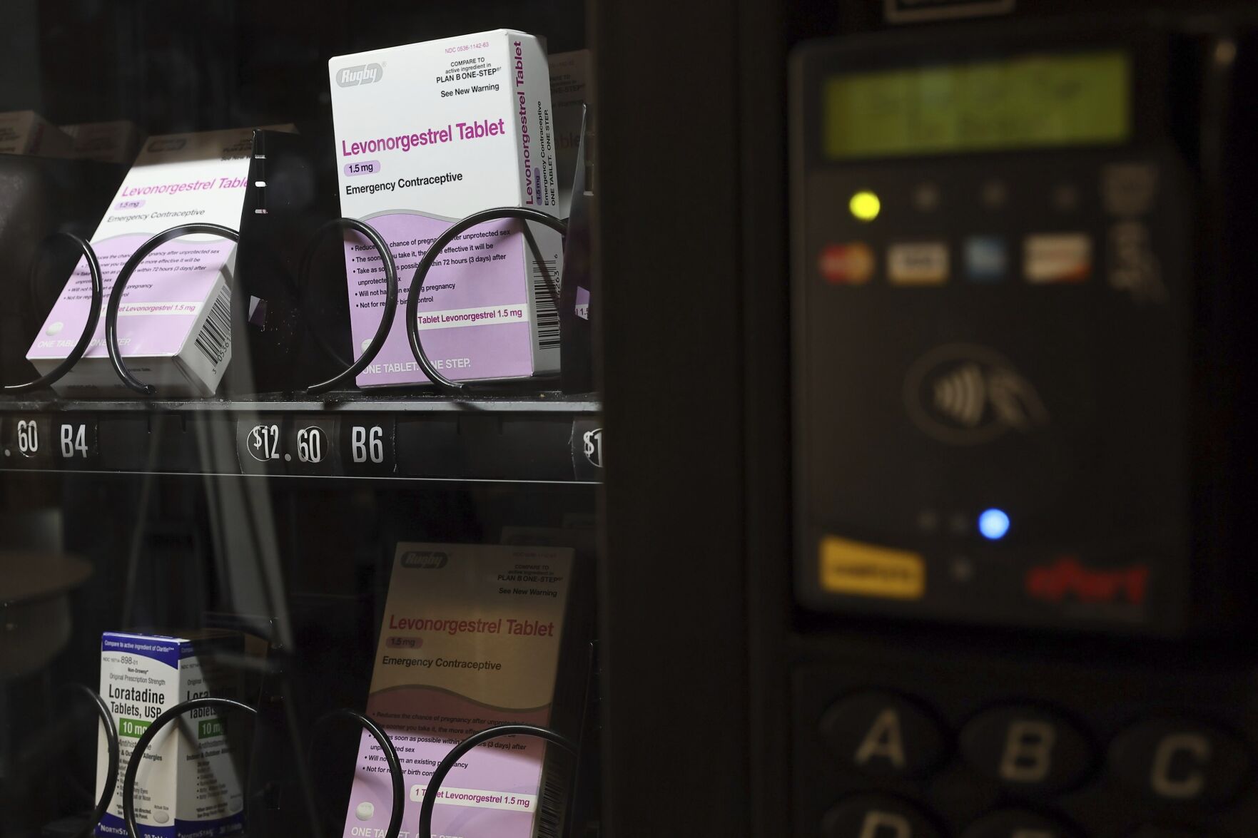 <p>A vending machine is stocked with emergency contraceptives at Odegaard Library on the campus of the University of Washington, Friday, June 2, 2023, in Seattle. After a student-led campaign to install the emergency contraceptive vending machine on campus in November, boxes of generic Plan B have been available to students for .60, a fraction of the cost charged in stores.</p>