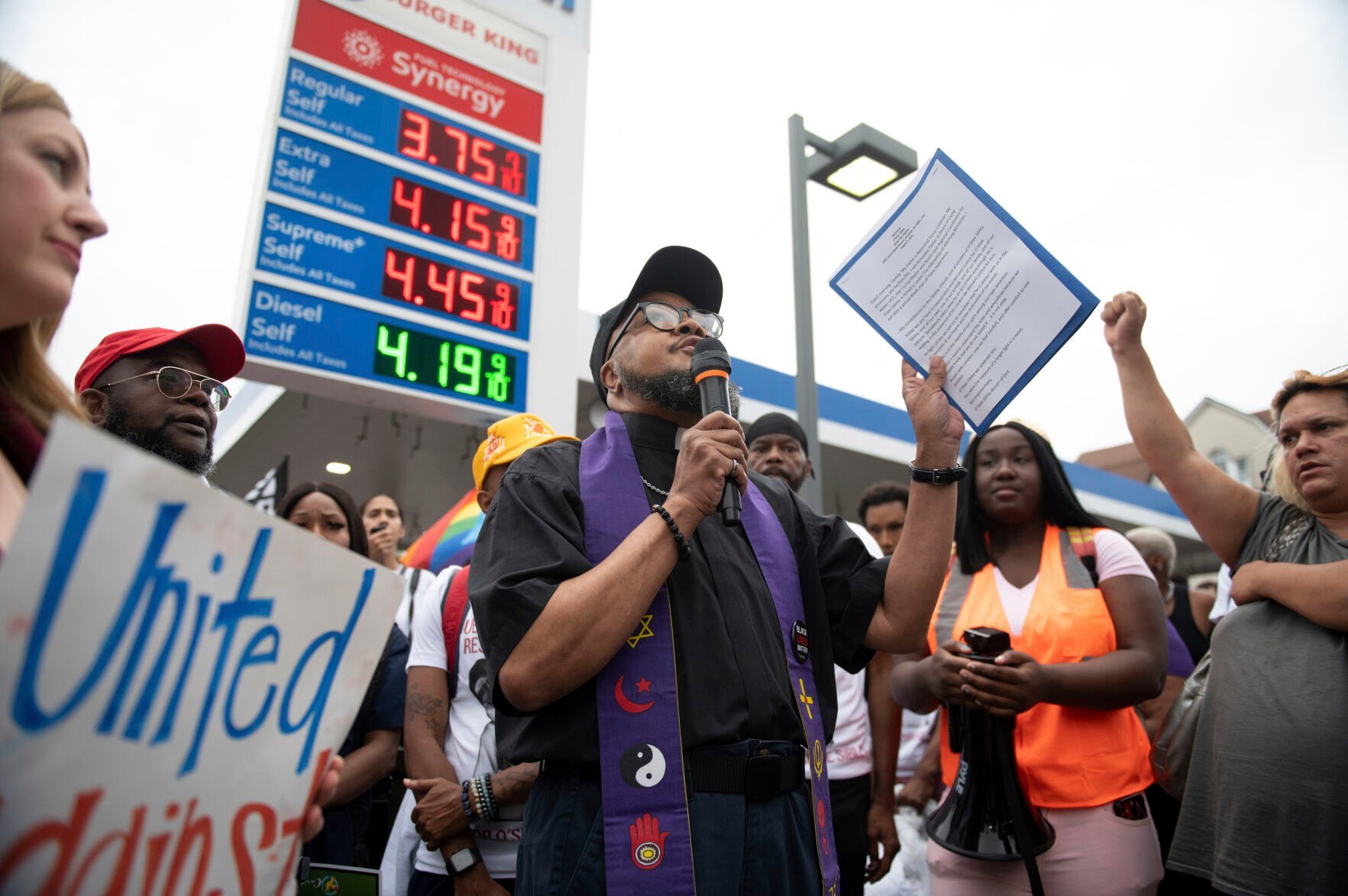 <p>CORRECTS SECOND SENTENCE - Rev. Yunus Coldman speaks during a gathering to memorialize O'Shae Sibley on Friday, Aug. 4, 2023, in the Brooklyn borough of New York. Sibley, a gay man, was fatally stabbed at the gas station after a confrontation between a group of friends dancing to a Beyoncé song and several young men who taunted them.</p>