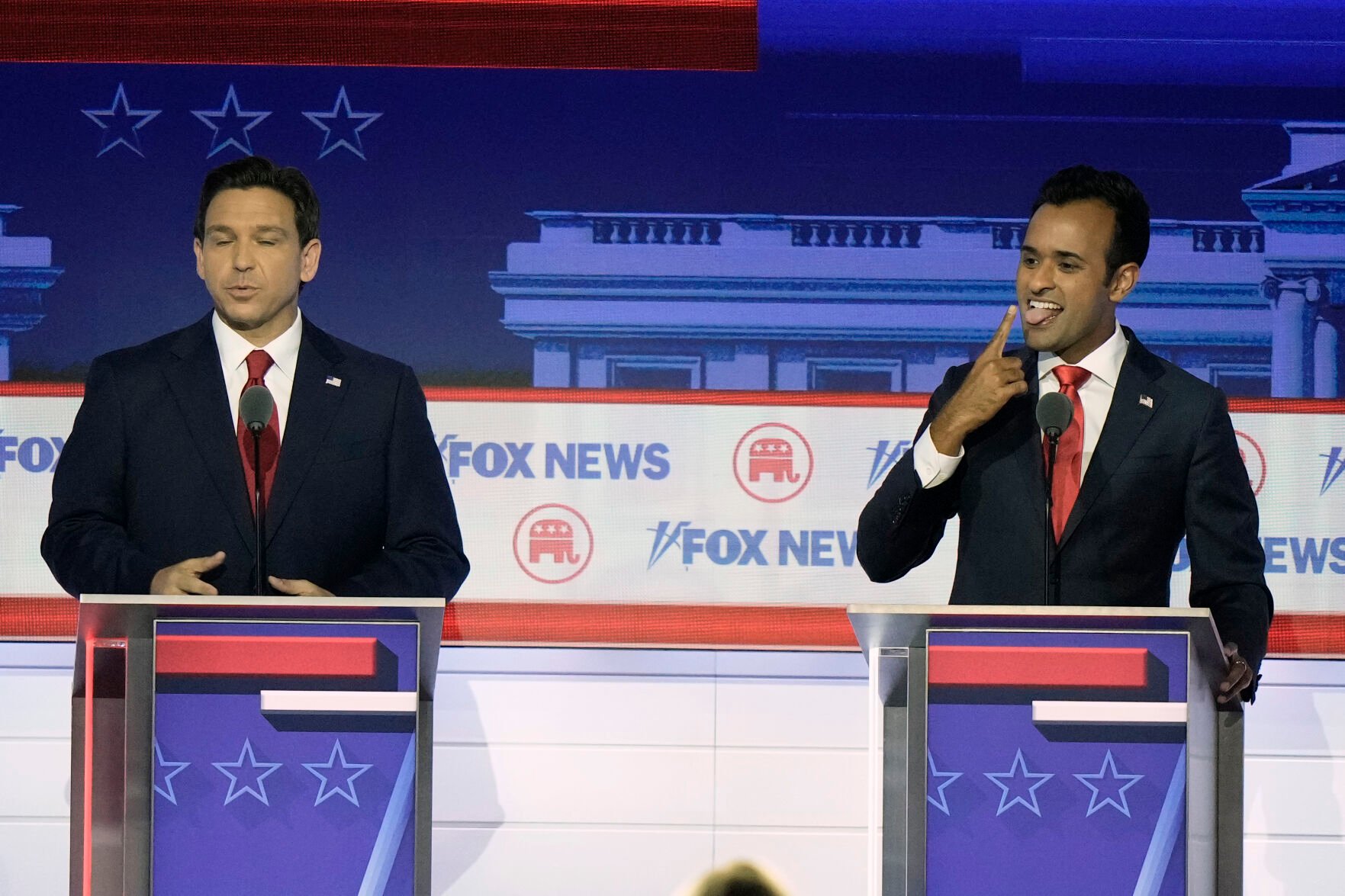 <p>Florida Gov. Ron DeSantis and businessman Vivek Ramaswamy speak during a Republican presidential primary debate hosted by FOX News Channel Wednesday, Aug. 23, 2023, in Milwaukee. (AP Photo/Morry Gash)</p>