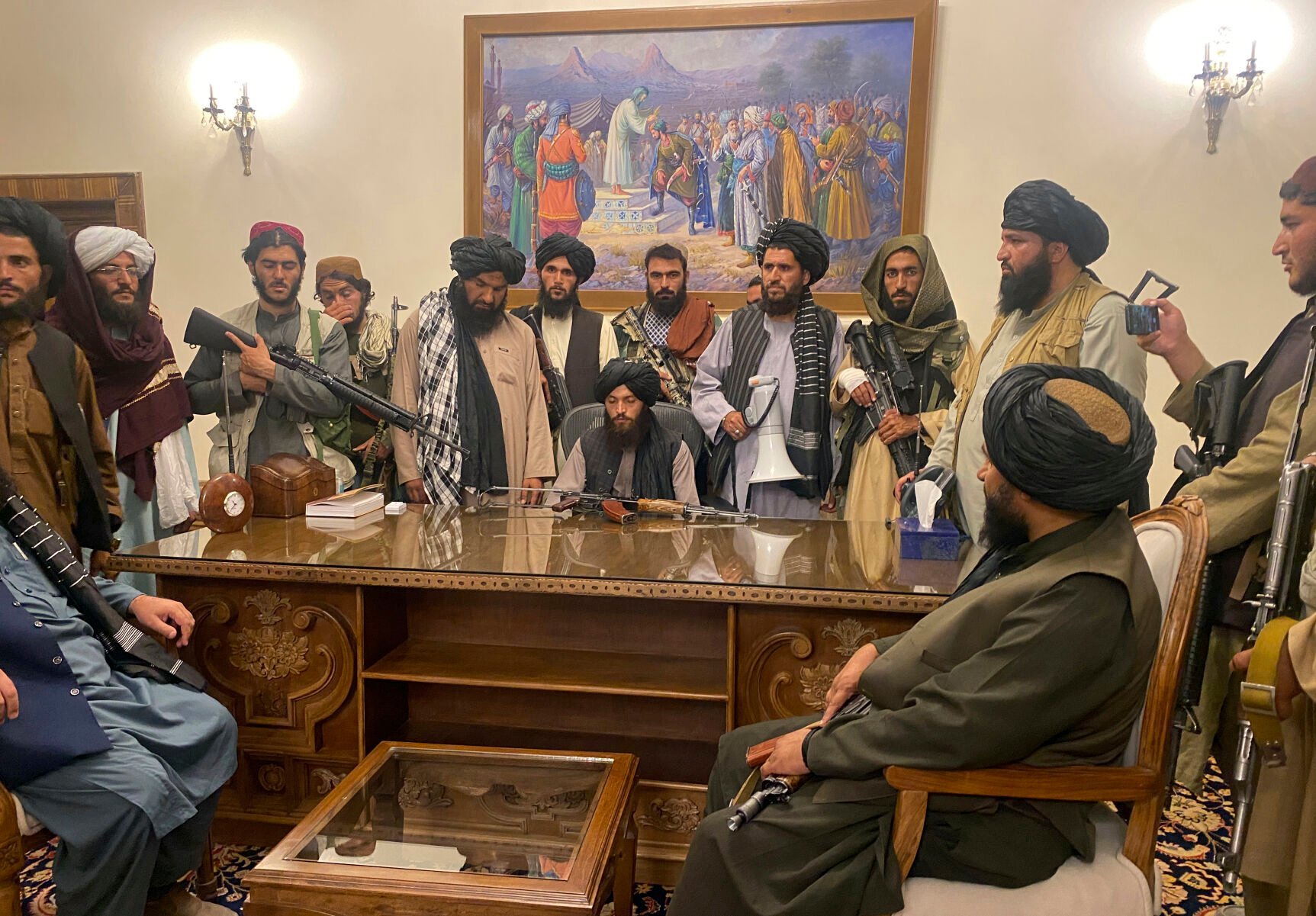 <p>File - Taliban fighters take control of the Afghan presidential palace after Afghan President Ashraf Ghani fled the country, in Kabul, Afghanistan, Sunday, Aug. 15, 2021. (AP Photo/Zabi Karimi, File)</p>