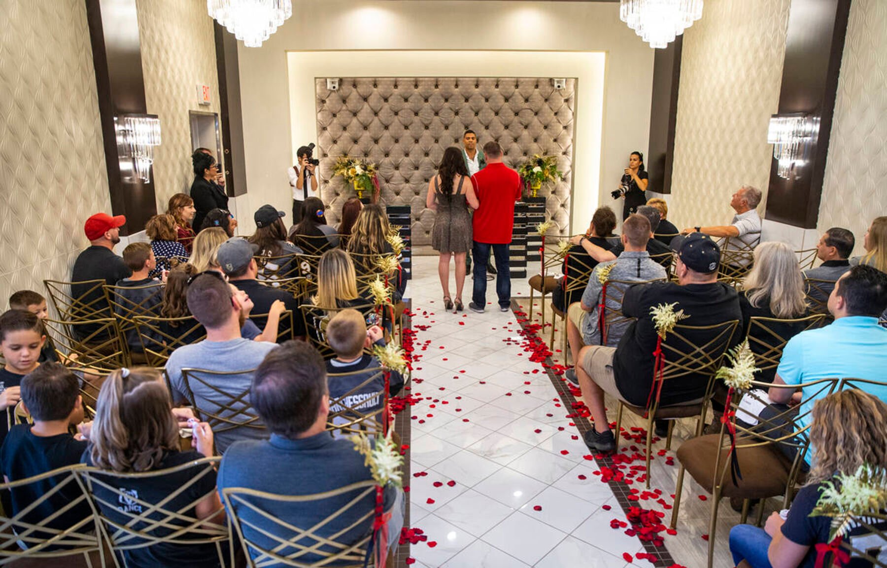 <p>Vegas Golden Knights player Ryan Reaves conducts a marriage vows renewal ceremony Sept. 1, 2019, for Laura and Justin Long at the Chapel of the Flowers in Las Vegas.</p>