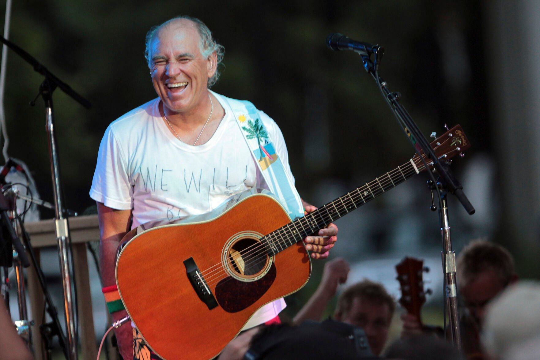 <p>FILE - Jimmy Buffett performs at his sister's restaurant in Gulf Shores, Ala., on June 30, 2010. “Margaritaville” singer-songwriter Jimmy Buffett has died at age 76. A statement on Buffett's official website and social media pages says the singer died Friday, Sept. 1, 2023 “surrounded by his family, friends, music and dogs”. (AP Photo/Dave Martin, File)</p>