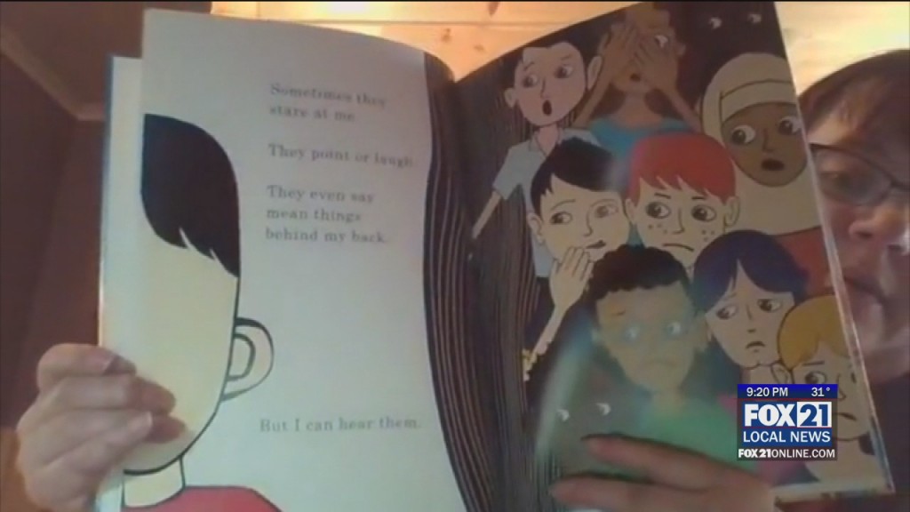 Teacher Reading To Students