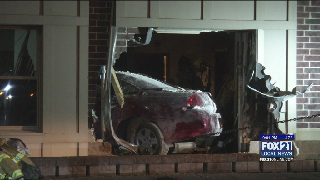 Car Crashes Into Building