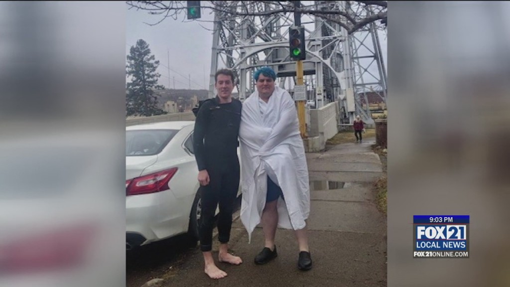 Surfer Rescues Man, Dog