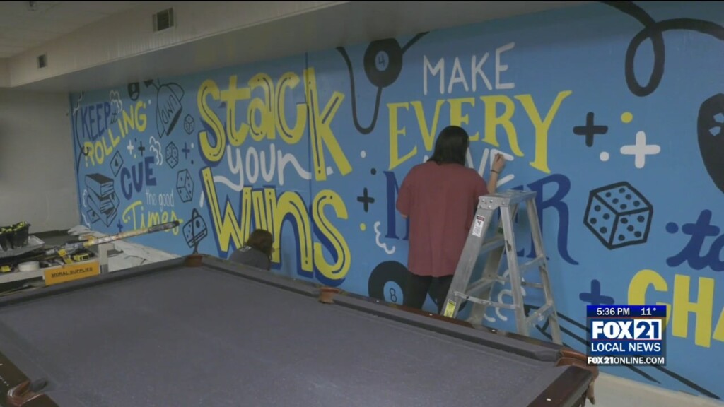Umd Graphic Design Students Painting A Student Housing Mural