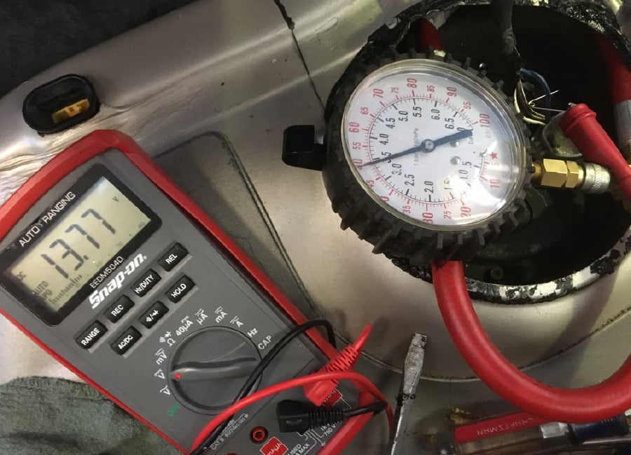 Monitoring fuel pump voltage and pressure at the front tank