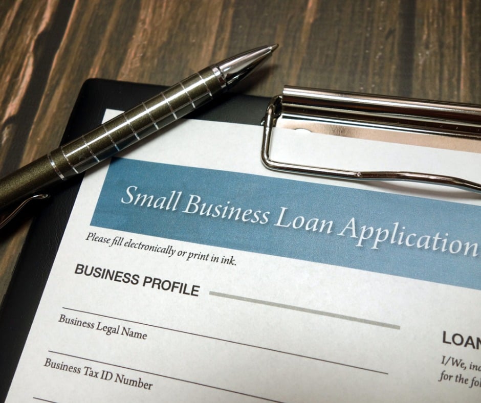 Clipboard With Small Business Loan Application Form And Pen On Desk Picture Id1150028178