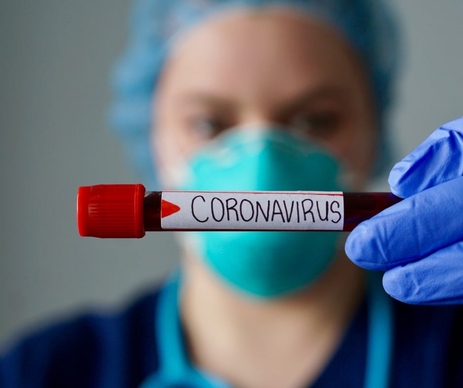 Nurse Wearing Respirator Mask Holding A Positive Blood Test Result Picture Id1201739887