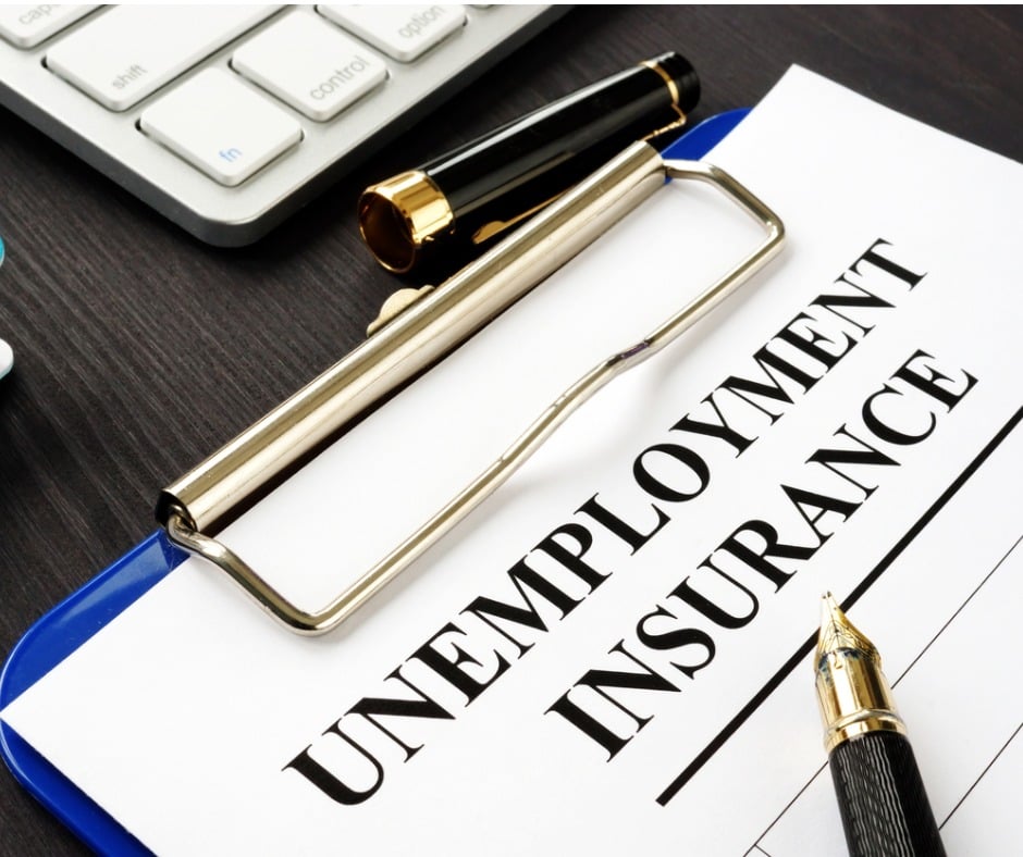 Unemployment Insurance Form And Clipboard On A Desk Picture Id1085283784