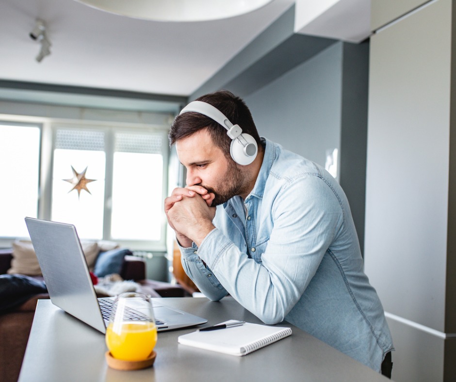 Young Man Is Watching A Online Course Picture Id1204044612