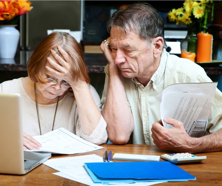Senior Couple At Home With Many Bills Picture Id94026939