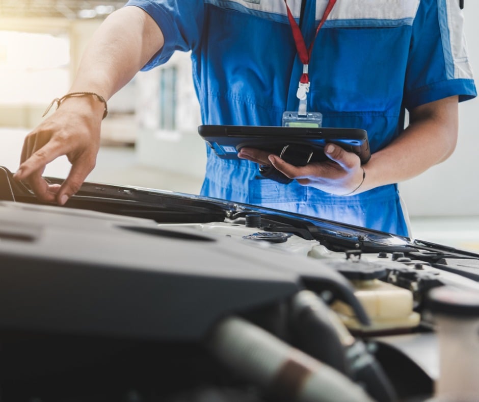 Auto Mechanic Uses The Tablet To Check Picture Id1137474295