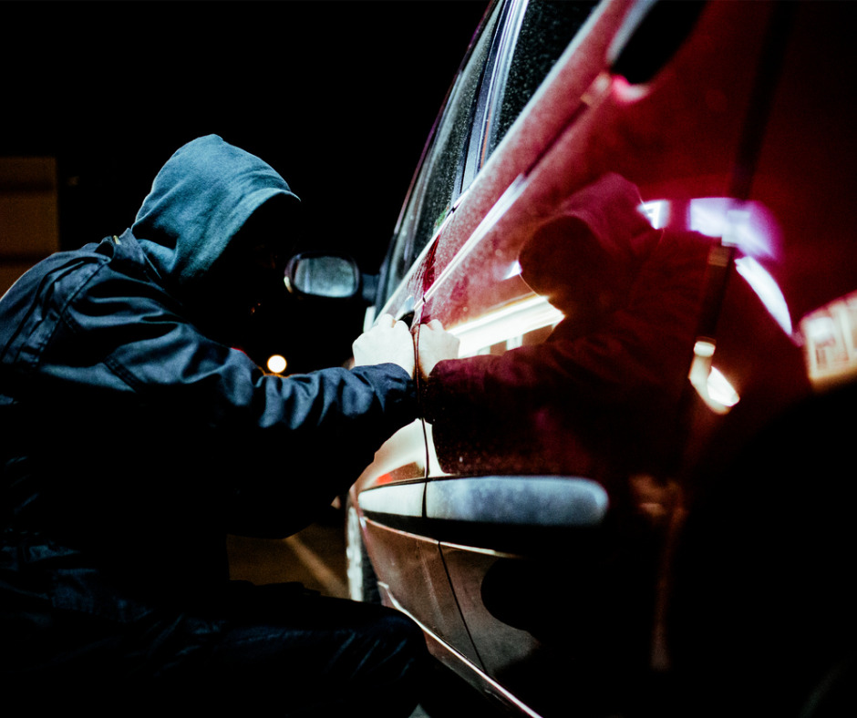 Man Stealing A Car Picture Id610780046