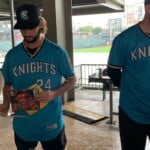 Knights Players Help With Books On The House