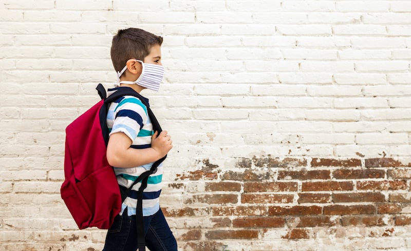 Little Boy Going To School With Protective Mask