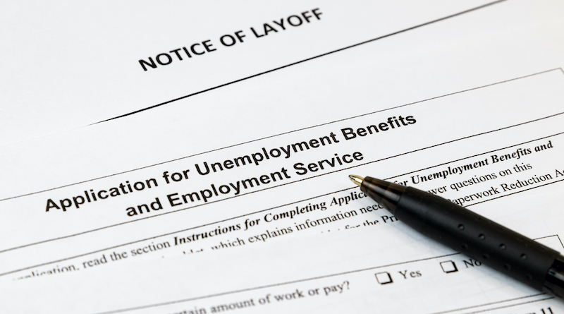 Job Layoff Notice And Application For Unemployment Insurance Benefits Paperwork. Concept Of Covid 19 Coronavirus And Stay At Home Order Impact On Economy