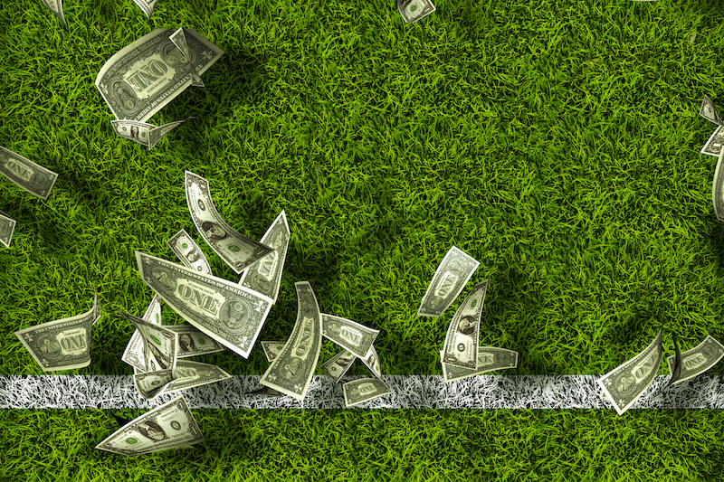 Green Grass With Dollar Bills. Gambling Thoughts.