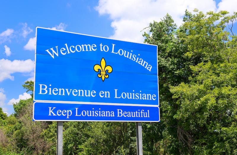 Welcome To Louisiana / Bienvenue En Louisiana Sign Next To Highway
