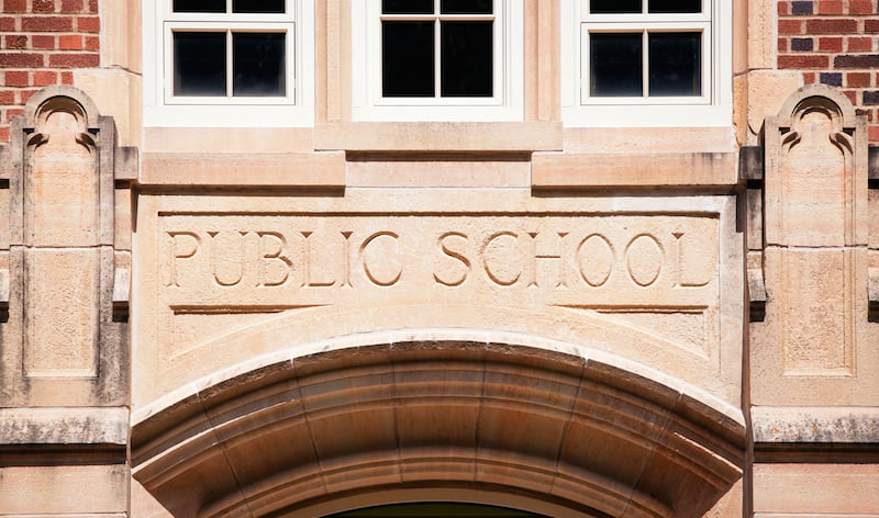 Public School Sign Carved In Granite Above Entrance