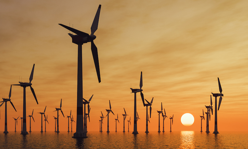Offshore Wind Turbines At Sunset