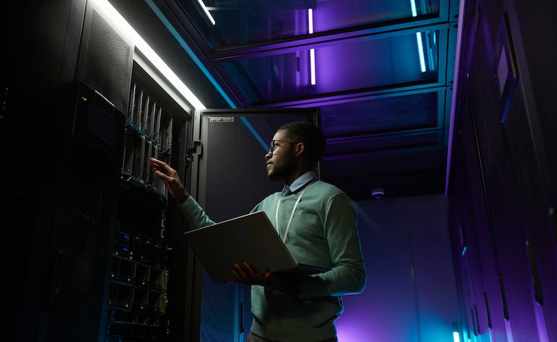 African American It Engineer In Data Center