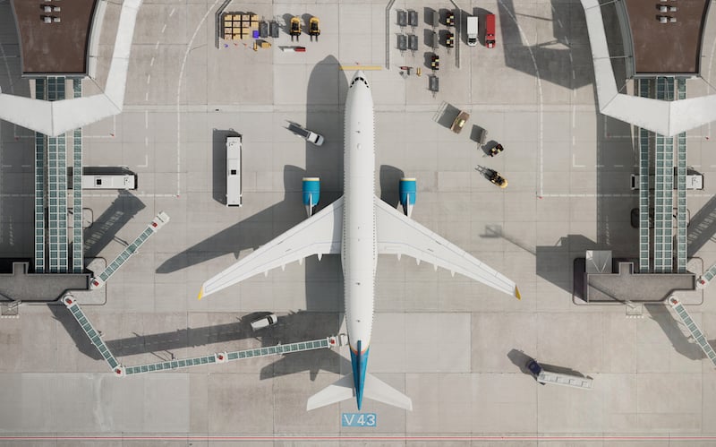 Top View Of Airplane At Airport Terminal In 3d