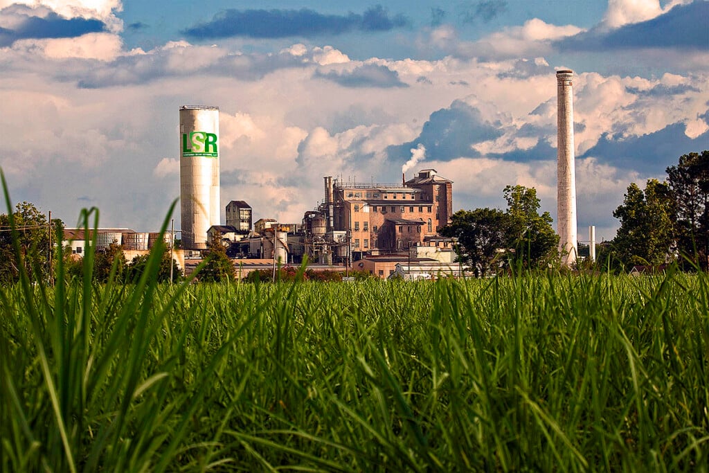 Imperial Sugar Plant Shot Across Sugar Cane Field In Gramercy, La.