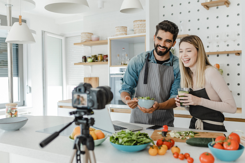 Young Couple Vlogging In The Kitchen