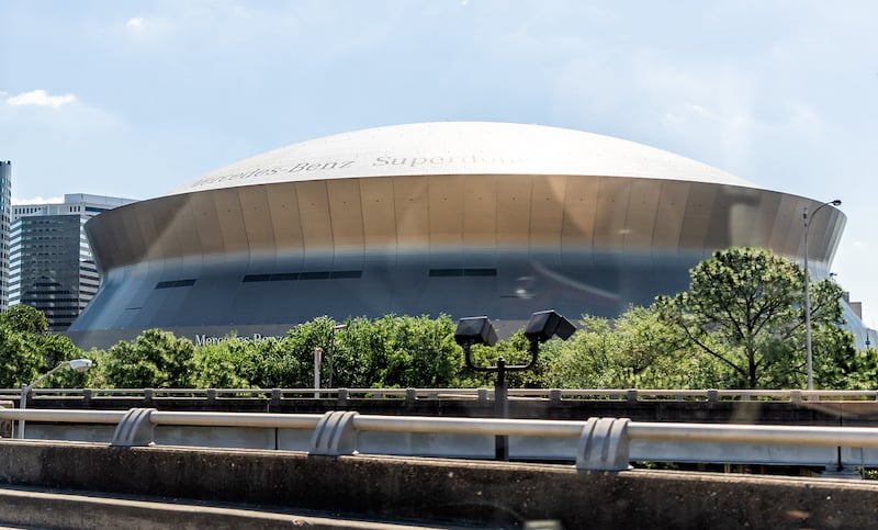 Famous Mercedes Benz Superdome Stadium In Louisiana With Car Window Side On Sunny Day