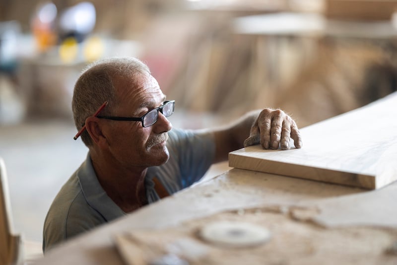 Senior Male Carpenter Working