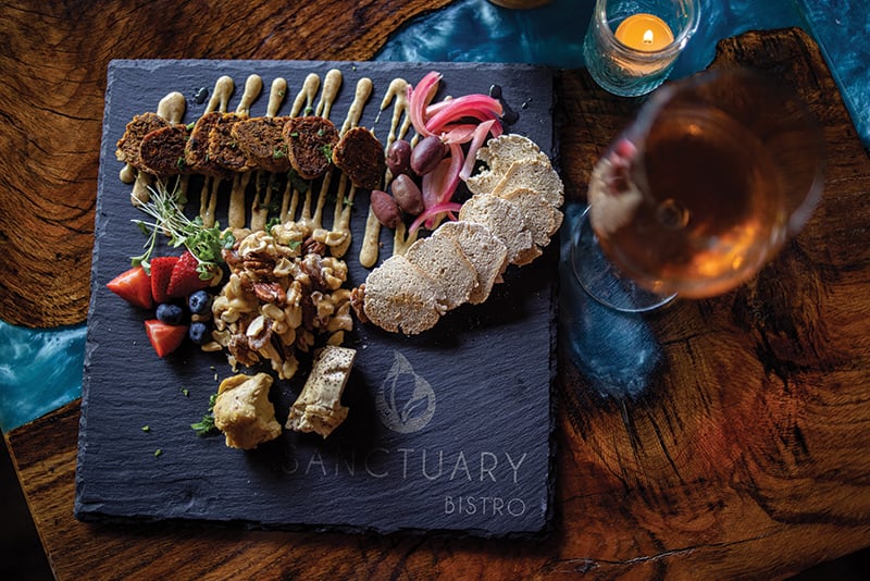Charlotte, North Carolina August 5th, 2022 : Jennifer Jones Horton Executive Chef Barry Horton Dishes: "charcuterie" Plate, Which Includes Smoky Cheddar And Lemon Peppercorn Cashew Chevre And Black Eyed Pea Sausage The King Trumpet Scallops (seared