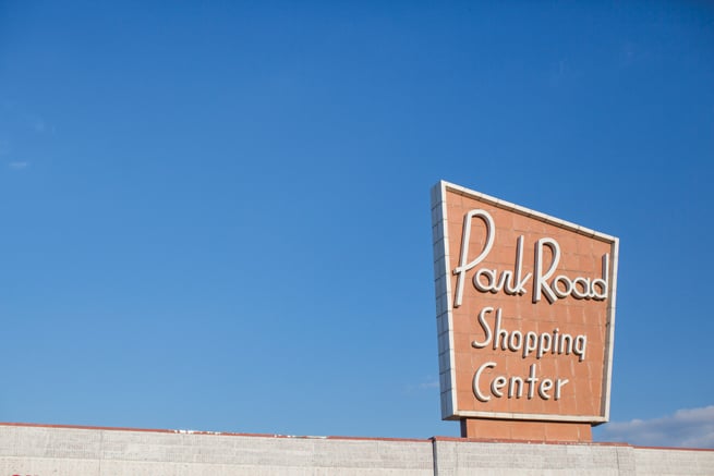 Charlotte, North Carolina - Signs in an uptown park point to other