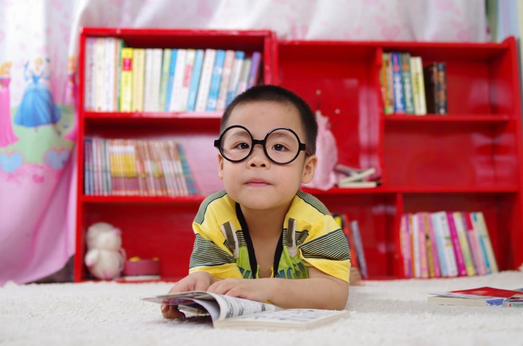 Asian Toddler Reading Charlotte Mecklenburglibrary